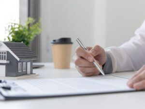 Person reviewing their insurance for their home